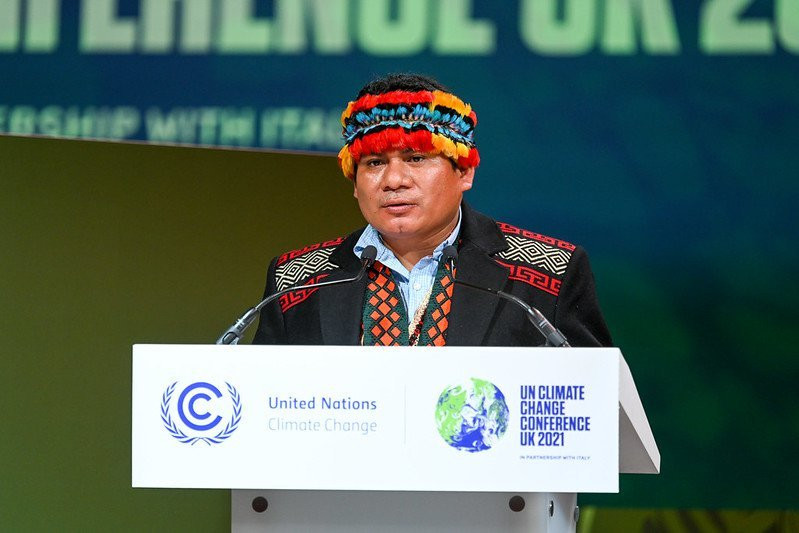 An Indigenous Leader addresses the COP26 Conference delegation.
